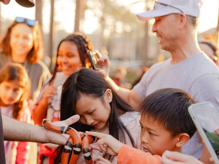 Children and parents at a family activation table.