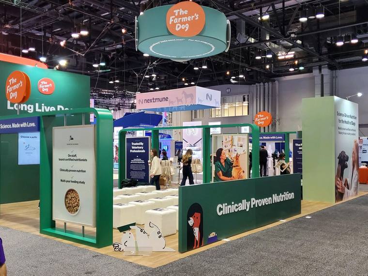A large-format trade show booth on a convention floor.